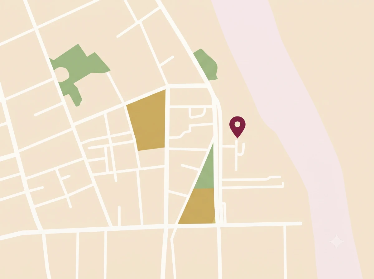 Stylised map of the riverside district of Phnom Penh, with a pin marking where Amiga is