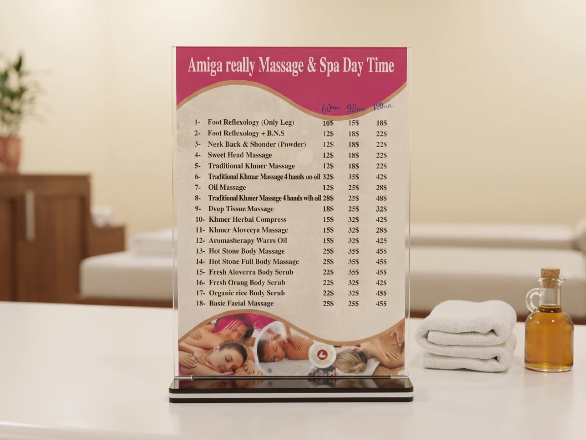 The printed price board of Amiga, resting on a table in the salon